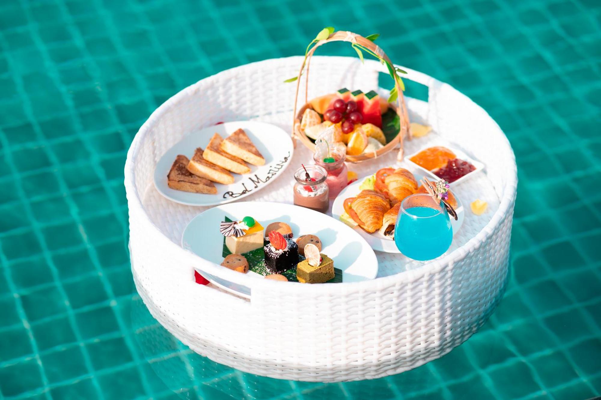 Bel Marina Hoi An Resort Exterior foto A floating breakfast tray